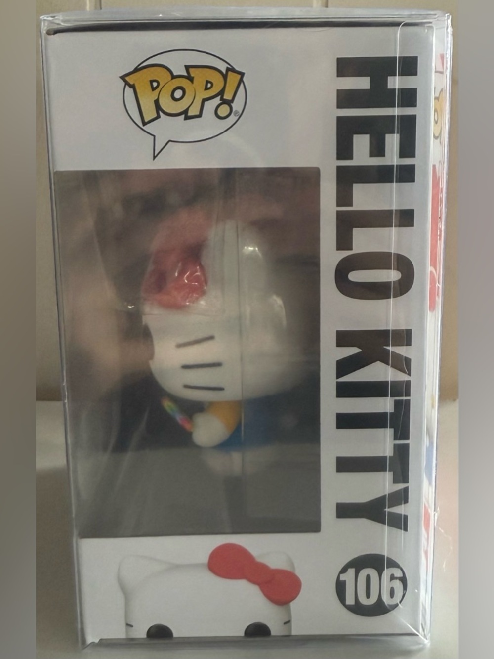 Funko Pop! Hello Kitty Flocked Figure with Red Bow and Blue Outfit - Picture 4 of 6